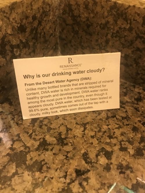 On the bath vanity was a sign which explained that their cloudy water was a result of the natural minerals in their water